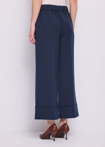 Pantaloni cropped da donna con risvolto