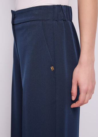 Pantaloni cropped da donna con risvolto