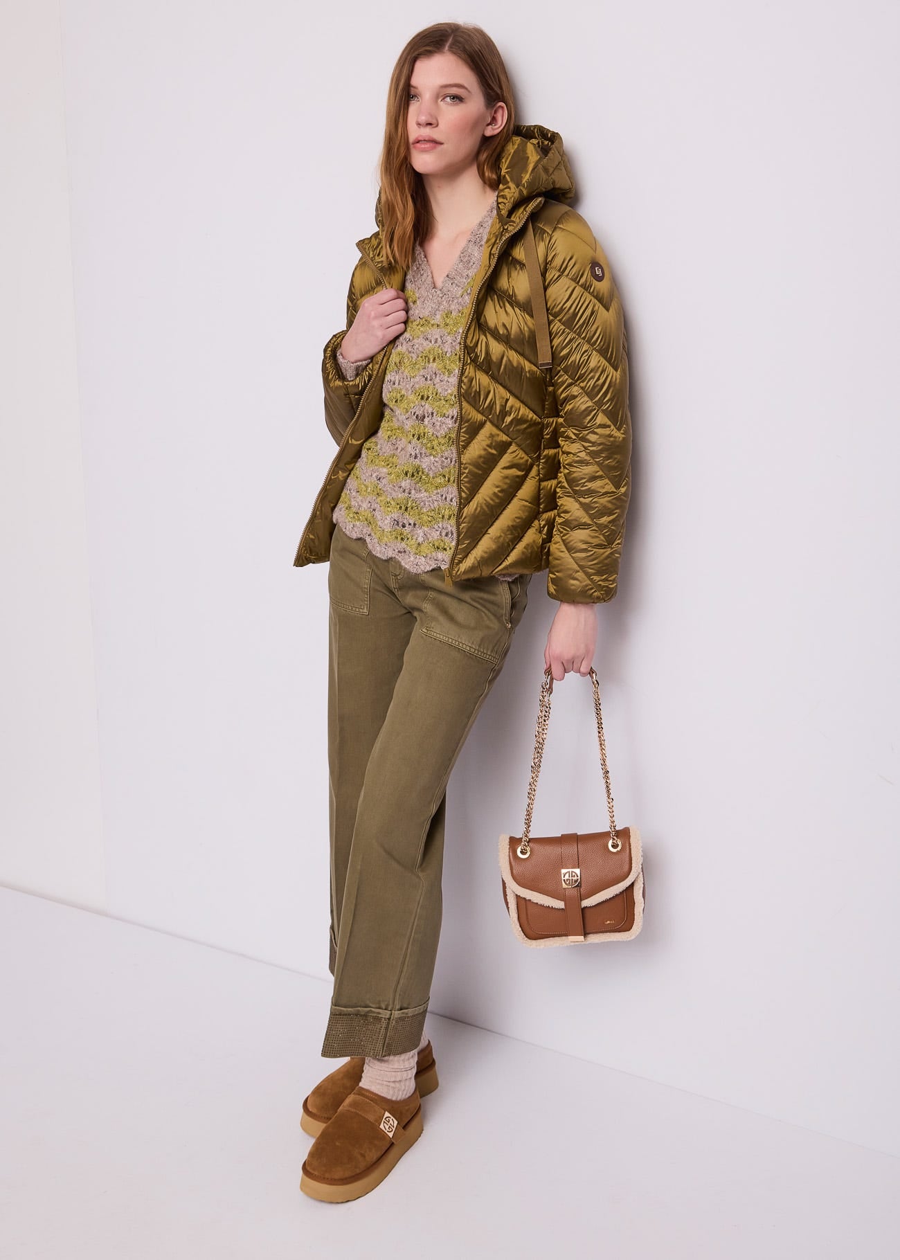 Piumino verde da donna in nylon con cappuccio