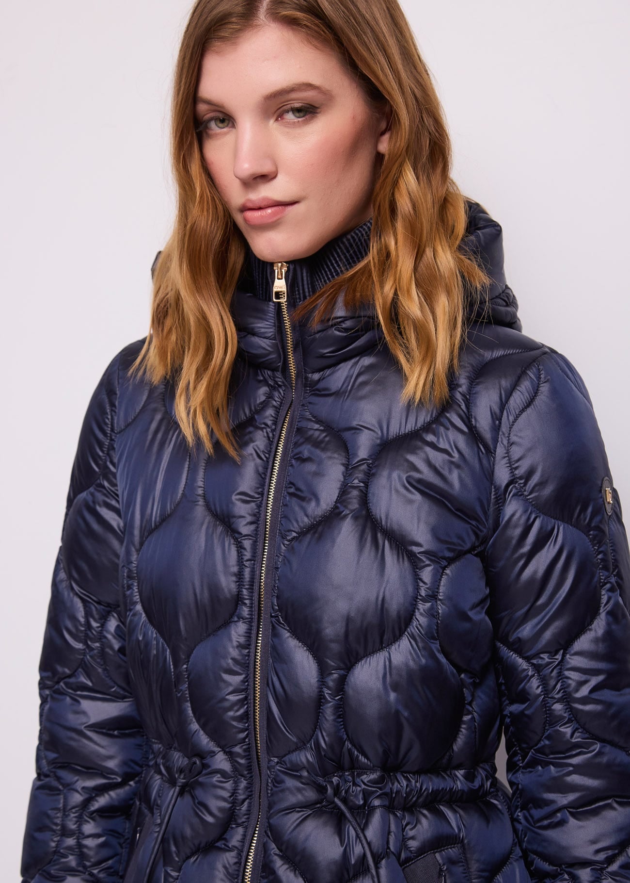 Piumino blu da donna in nylon imbottito