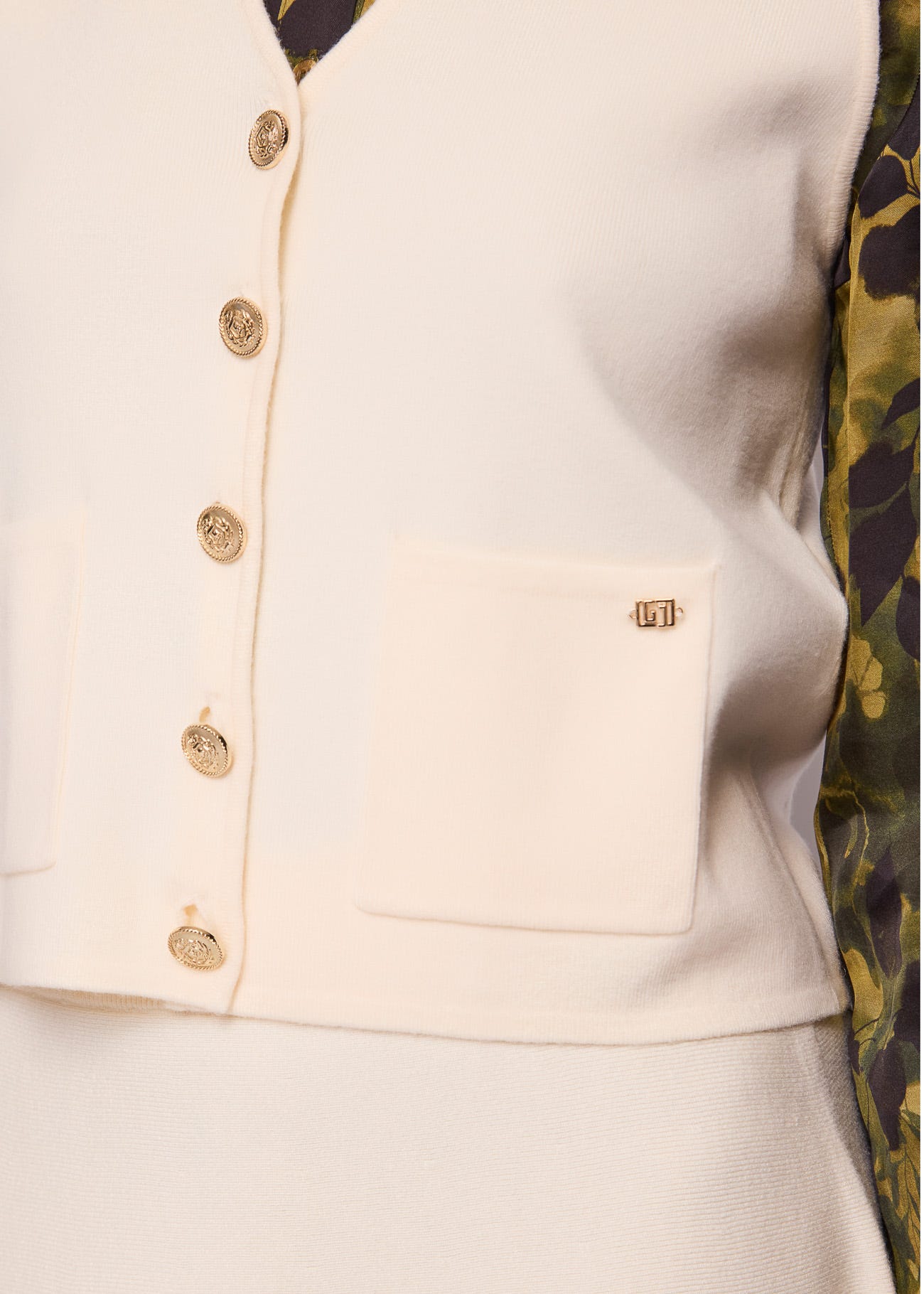 Gilet da donna con bottoni dorati