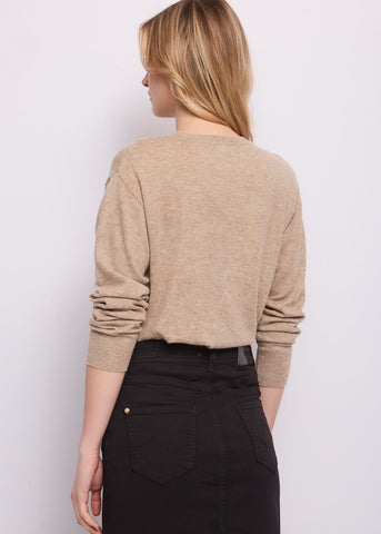Maglia beige da donna con borchie e strass