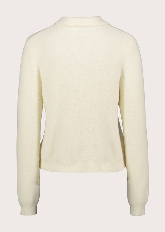 Polo da donna con bottoni gioiello