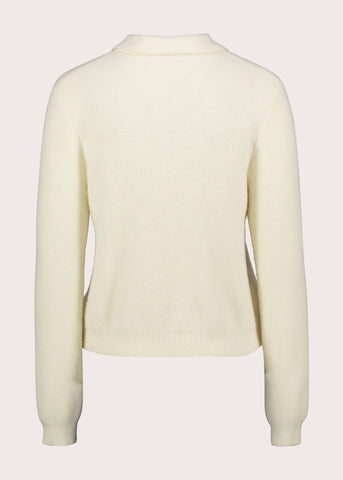 Polo da donna con bottoni gioiello