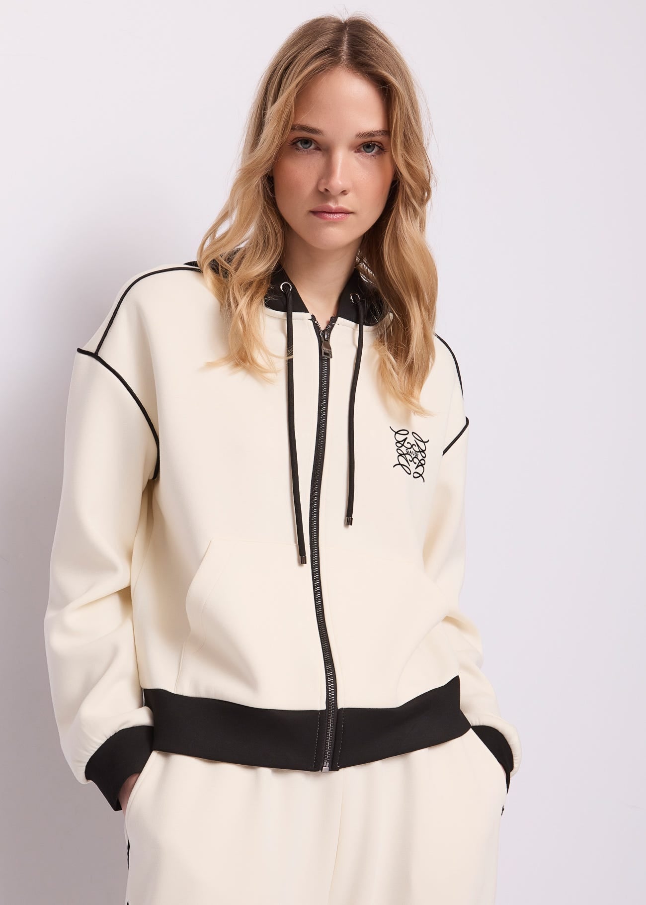 Felpa bianca da donna con cappuccio e zip