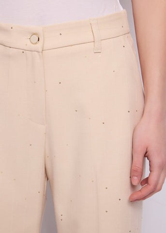 Pantaloni flare cropped da donna con piega