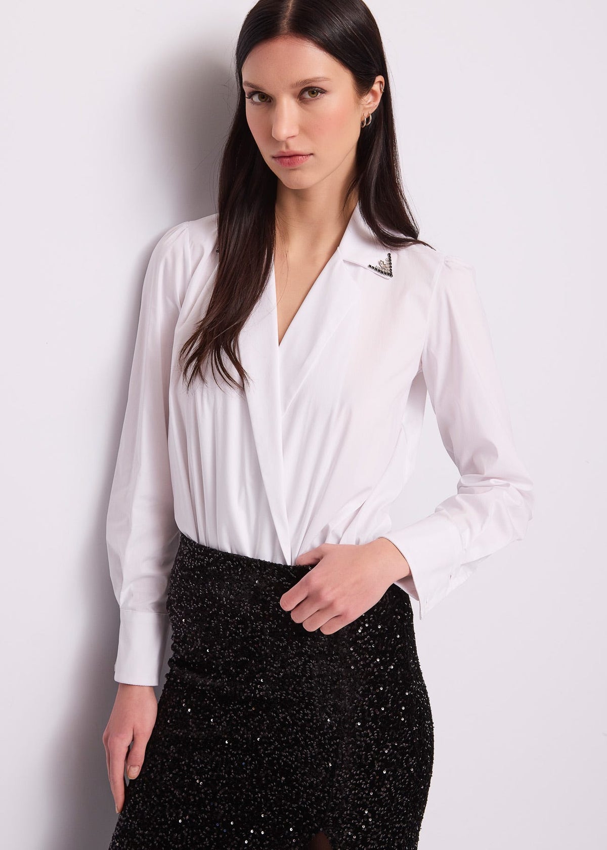 Body da donna con revers e strass