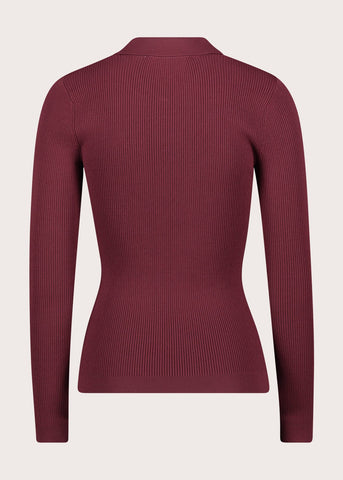 Polo da donna con bottoni dorati